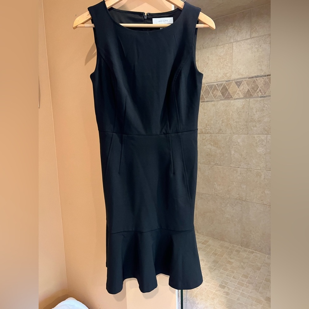 Black dress with ruffle bottom
